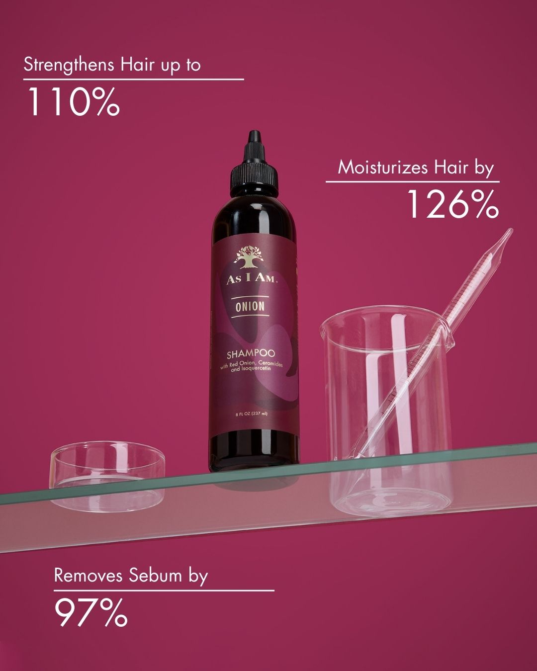 زجاجة شامبو As I Am Onion على خلفية وردية مع نص يوضح مزايا المنتج.